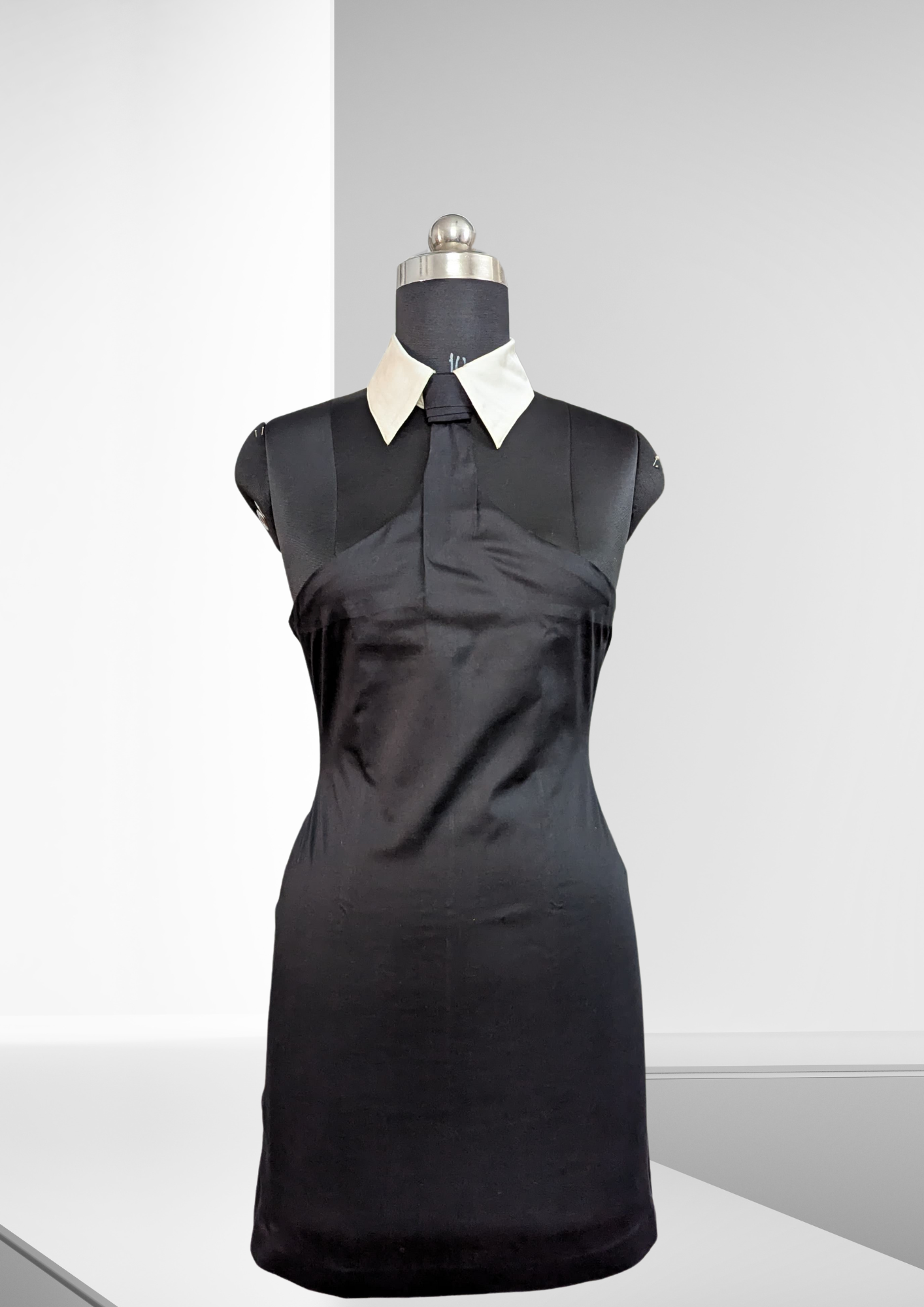 K-Drama-Inspired Chic Dress - Sleeveless Black Mini Dress with White Contrast Collar & Tie Detail – BASIC