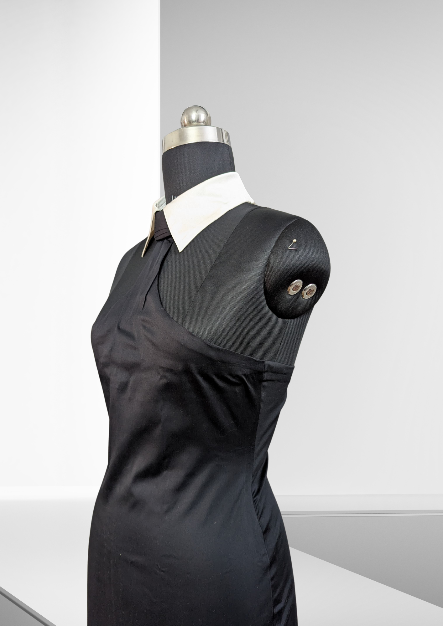 K-Drama-Inspired Chic Dress - Sleeveless Black Mini Dress with White Contrast Collar & Tie Detail – BASIC