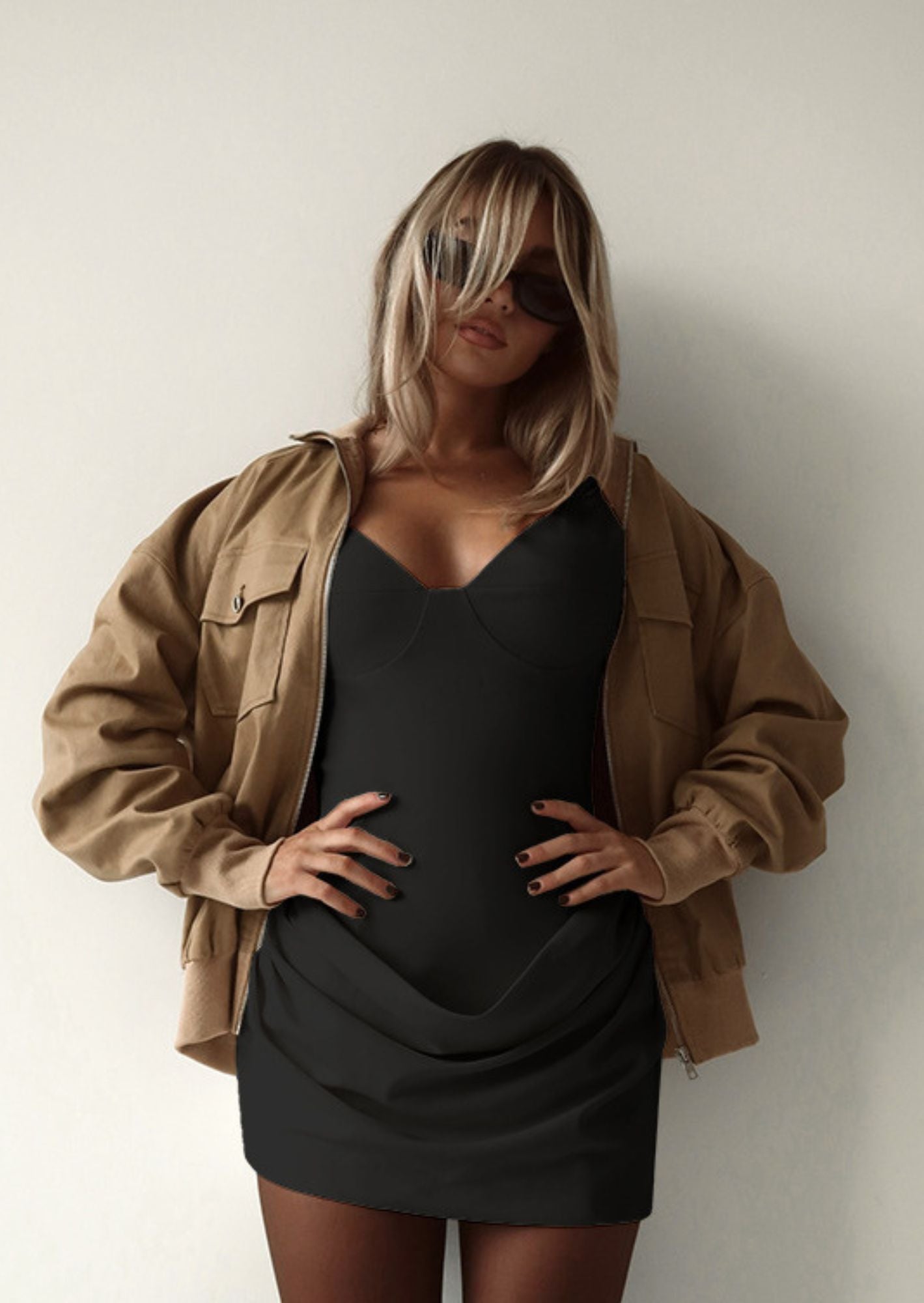 Paris Fashion Week-Inspired Runway Elegance - Sculpted Black Front-Pleated Mini Dress – BASIC