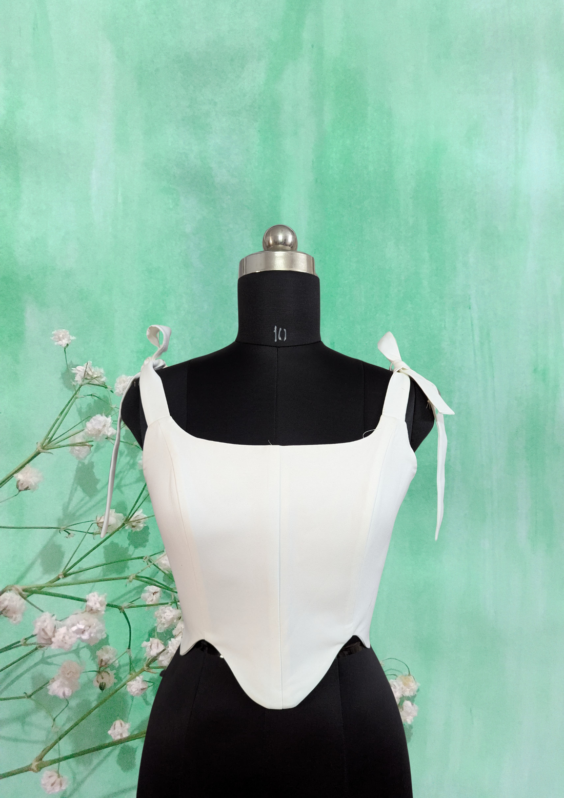 Corset Top With Tie Up Strap And Asymmetrical Hem